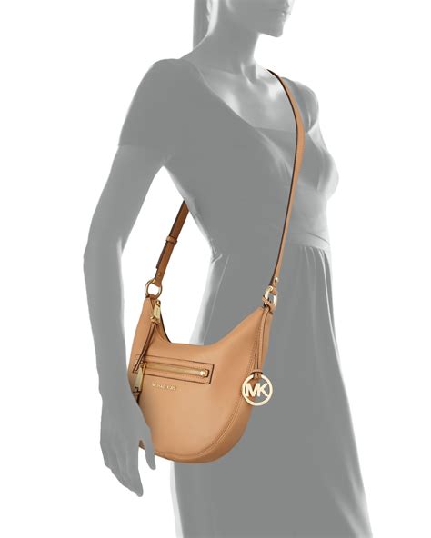 michael kors rhea small messenger bag|MICHAEL Michael Kors Logo Rhea Zip Extra Small Messenger .